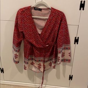 Red floral romper with synched tie waste